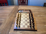 Chess pieces and board are magnetic.
